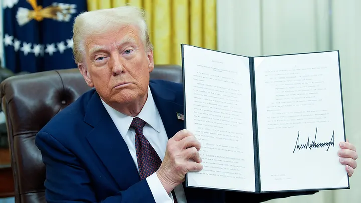 On January 23, 2025, President Donald Trump issued an executive order in the Oval Office of the White House. This recent action has sparked renewed discussions regarding birthright citizenship. (Yuri Gripas/Abaca/Bloomberg via Getty Images)