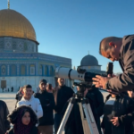 Palestinians gaze at moon at Jerusalem's Al Aqsa ahead of Ramadan