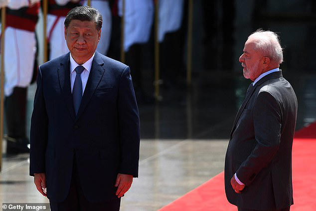 The Communist nation - under President Xi Jinping (pictured) has spent years fostering a strategy that transitioned from building housing to $1.9trillion constructing factories to make cheap goods for export, seeing them rise 13 percent and 17 percent in 2023 and 2024