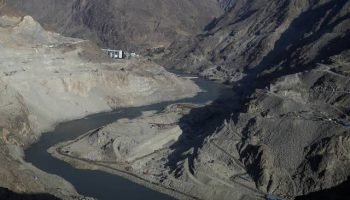 Who Owns a Shared River?